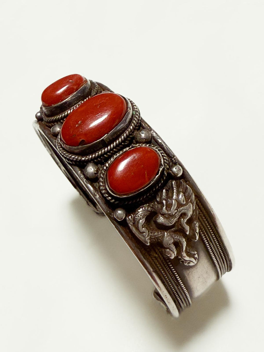 1970s Nepalese Silver & Coral Cuff with Dragon–Serpent Motif