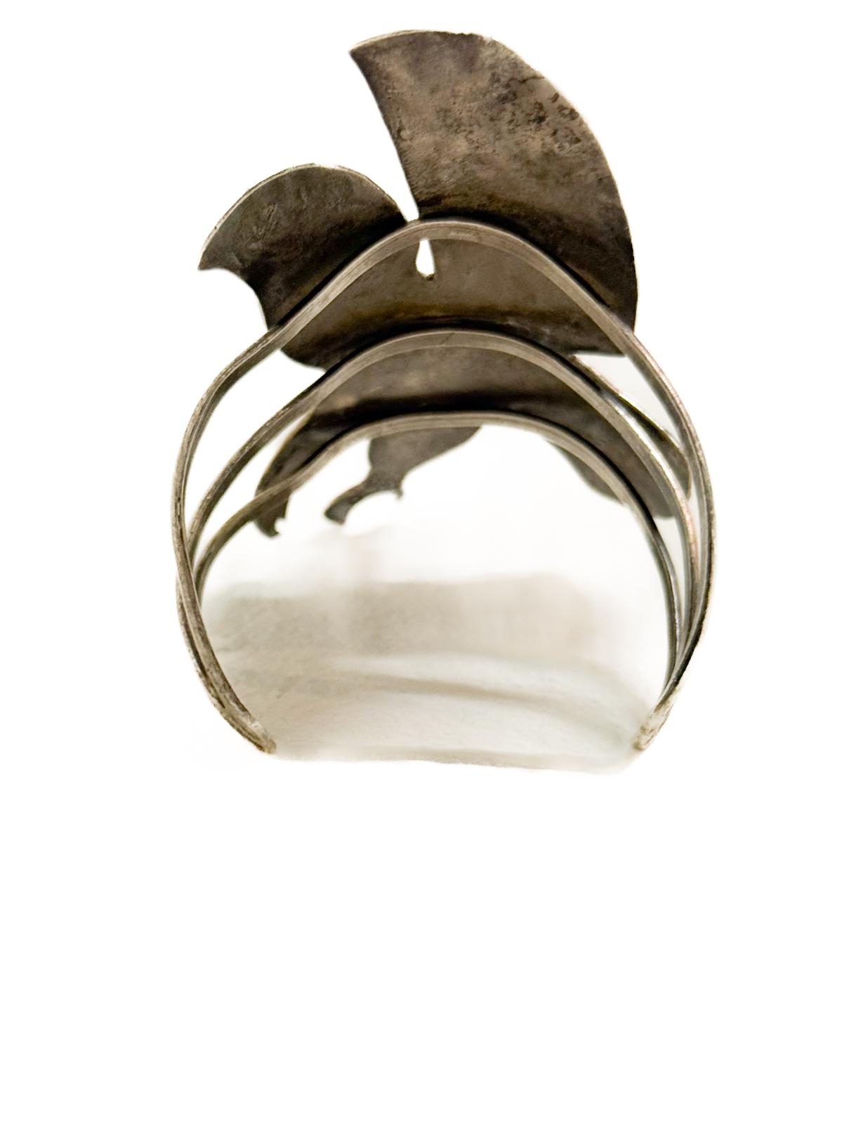 1960s–70s Southwestern Thunderbird Cuff in Sterling Silver with Turquoise and Coral Chip Inlay (HMIJ, Gilbert Ortega Shop)