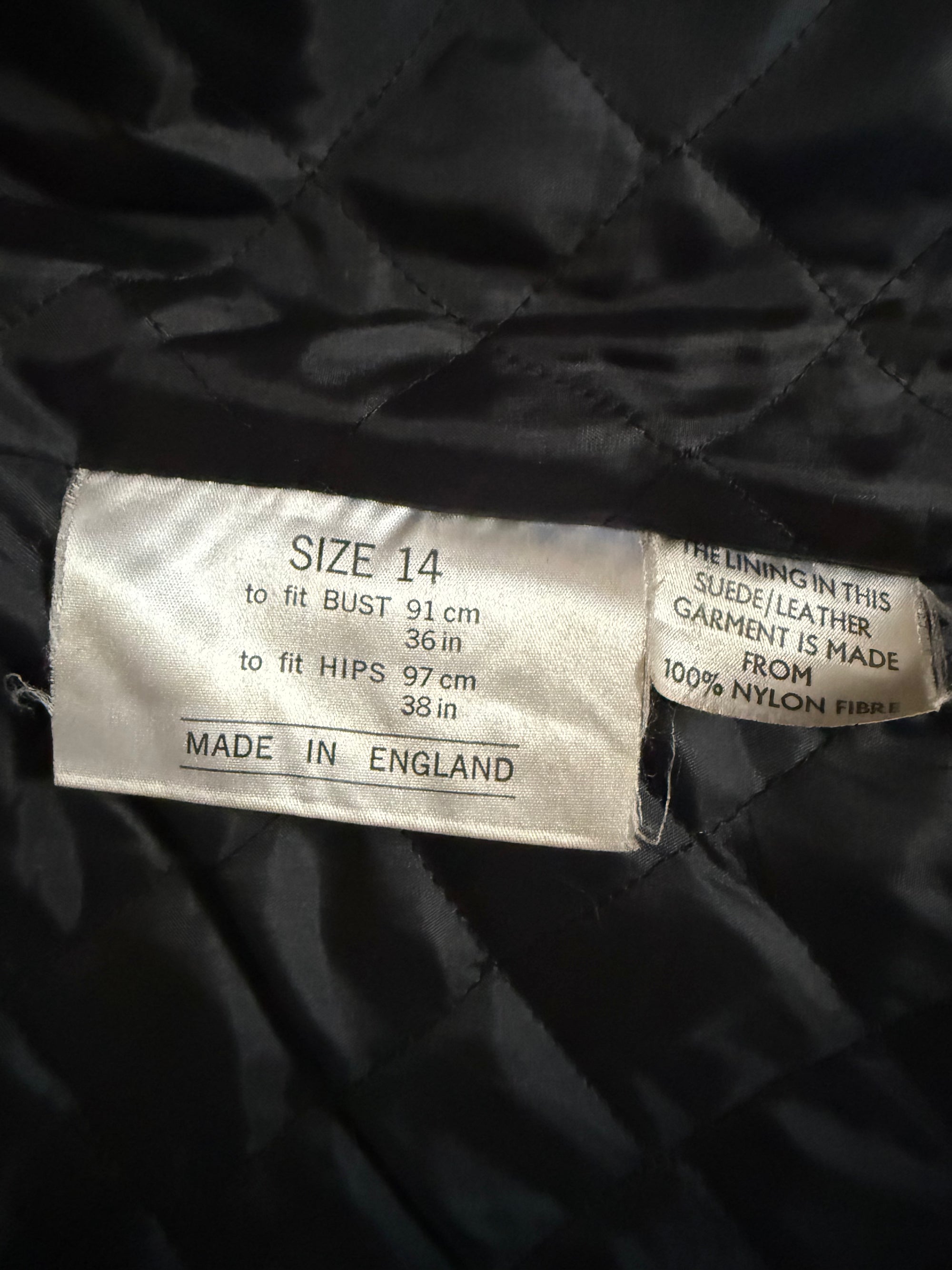 Lange kieferngrüne Lederjacke aus den 1970er-Jahren mit Pelzkragen