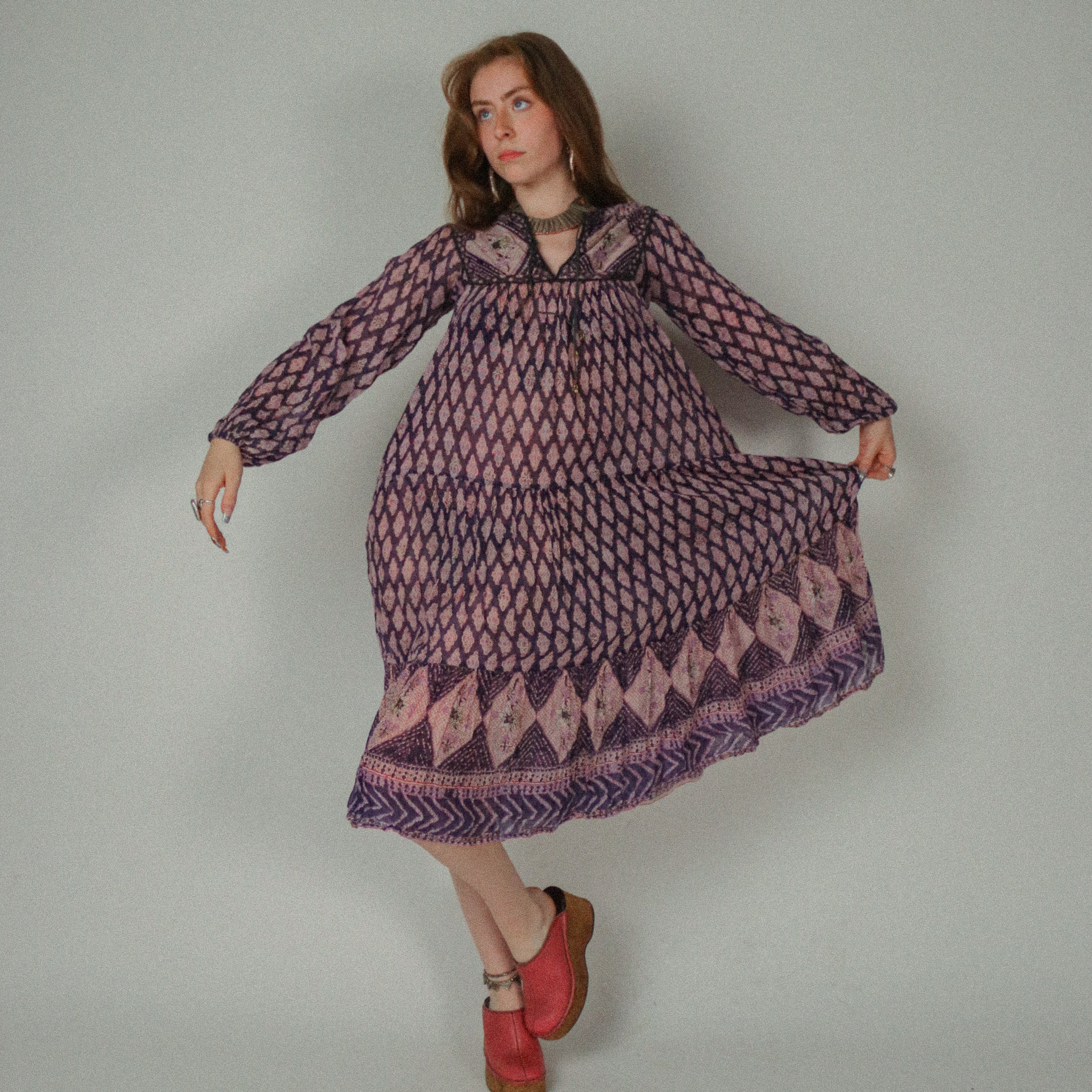 Woman wearing a 1970s Phool Cotton Gauze Dress  on a plain background
